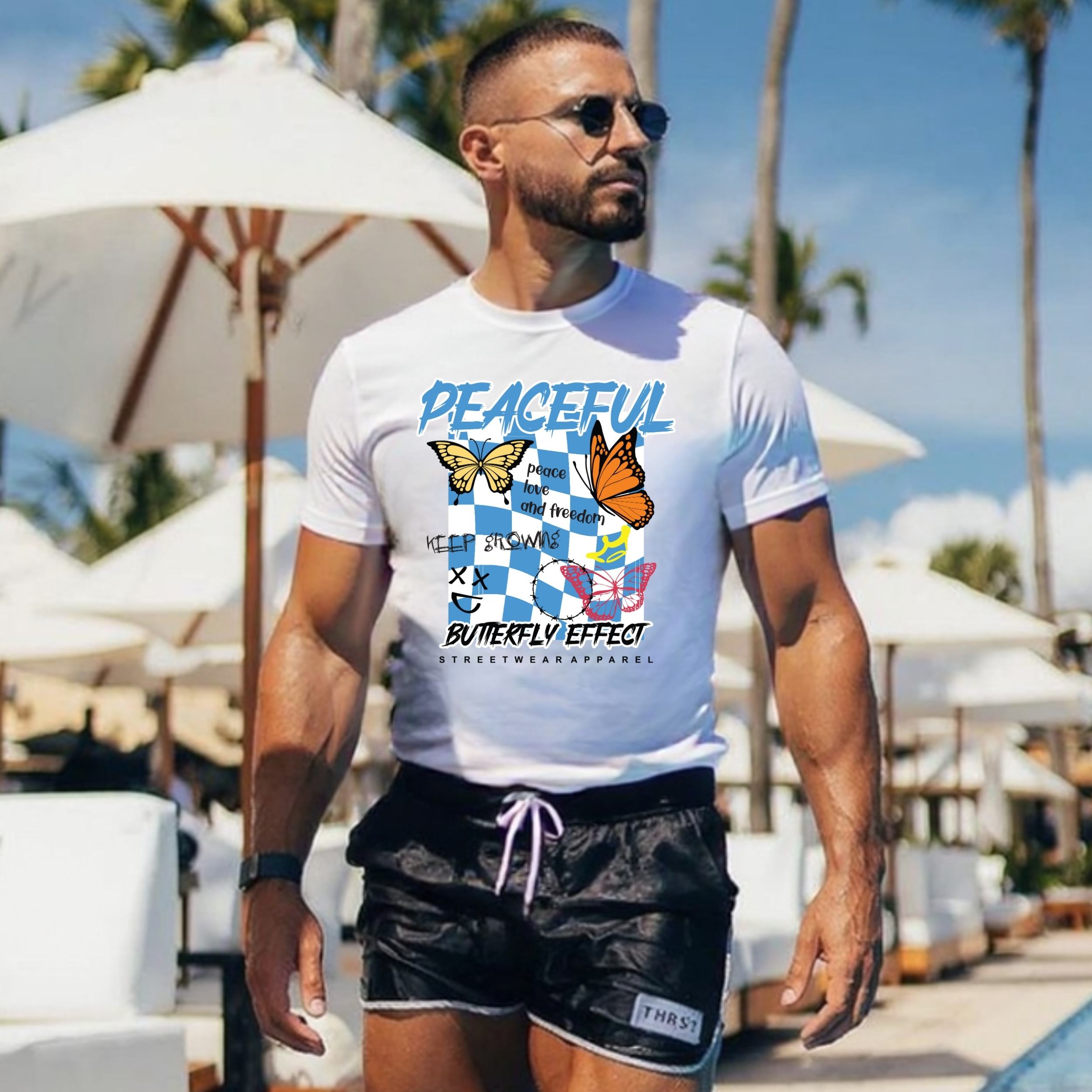 Camiseta Blanca «Peaceful Butterfly Effect» – Estilo Streetwear con Mariposas Camiseta Blanca «Peaceful Butterfly Effect» – Estilo Streetwear con Mariposas